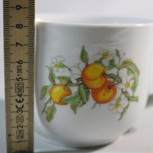 Kaffekopp med fat, fruktmotiv