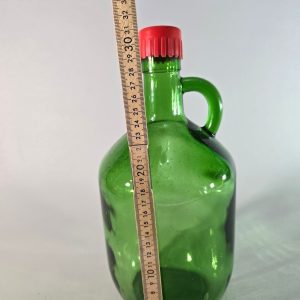 Stor flaska i grönt glas, troligen Frankrike