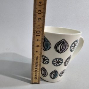 Mugg med Blad- och Citrusmönster