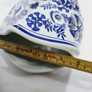 Ett par Koi Fiskformade Ljushållare
