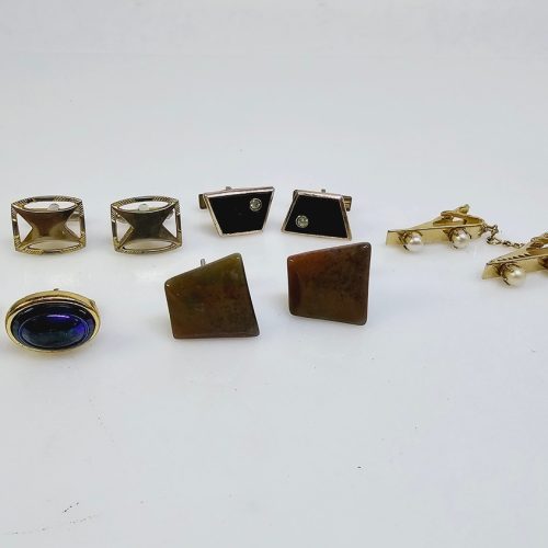 Elegant samling av vintage manschettknappar och accessoarer