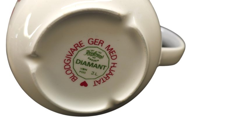 Set med 7 kaffekoppar "Blodgivare ger med hjärtat" från Rörstrand Diamant, J.L