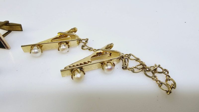 Elegant samling av vintage manschettknappar och accessoarer