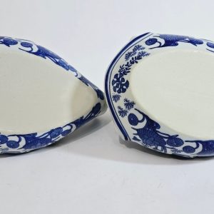 Ett par Koi Fiskformade Ljushållare