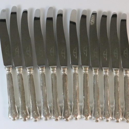Knivar, märkta "Guldsmeds AB i Sthlm", rostfritt, 12 delar