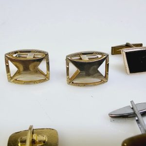 Elegant samling av vintage manschettknappar och accessoarer