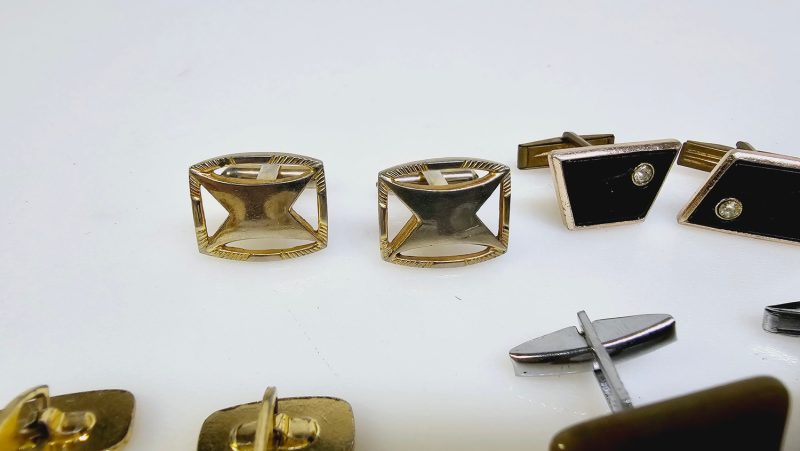 Elegant samling av vintage manschettknappar och accessoarer