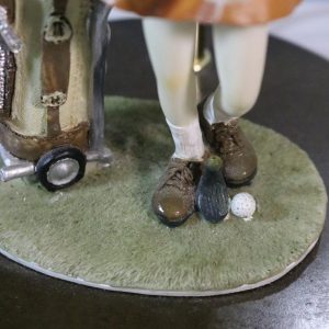 Bordslampa, med figur av kvinna med golfklubba - golf