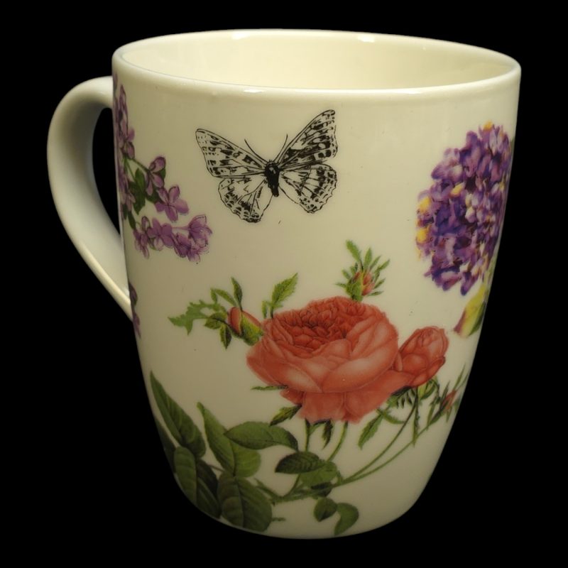 Charmig mugg med blommotiv och fjäril – Perfekt för naturälskare!