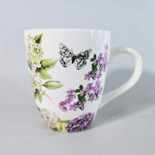 Muggar i porslin, med dekor av blommor och fjärilar - ICA