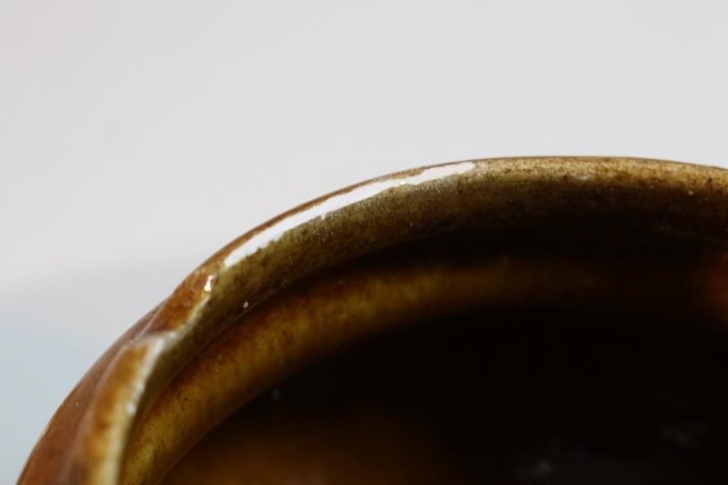 SKÅL, troligen Majolika, brun med gröna detaljer
