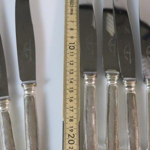 Knivar, märkta "Guldsmeds AB i Sthlm", rostfritt, 12 delar