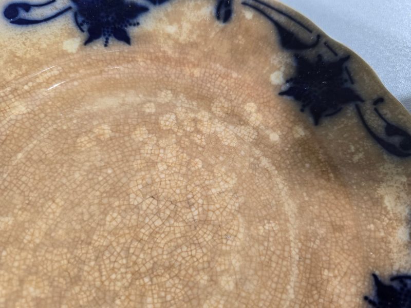Assiett och kaffekopp, flytande blått, kraftigt missfärgade, Göteborg