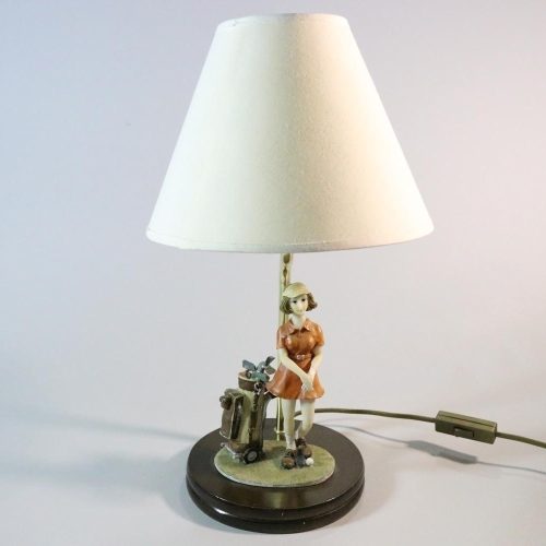 Bordslampa, med figur av kvinna med golfklubba - golf