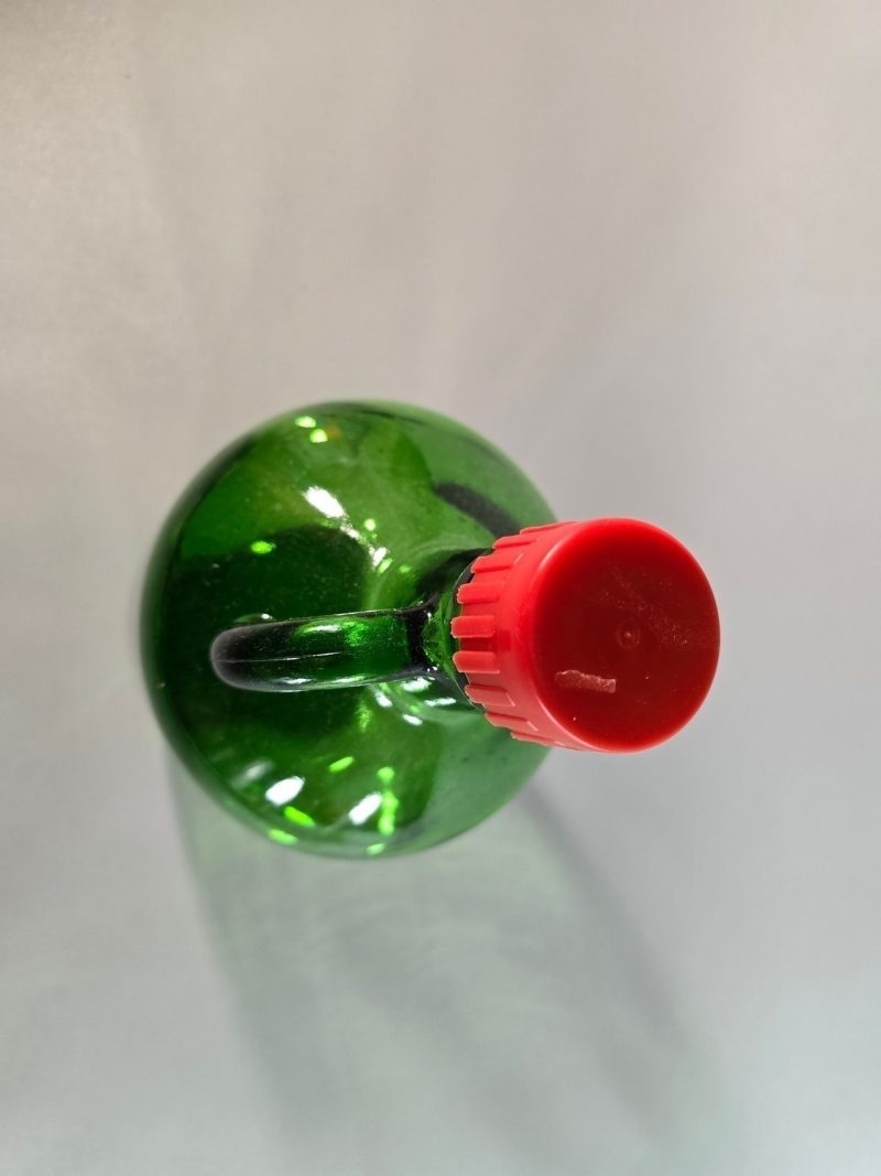 Stor flaska i grönt glas, troligen Frankrike
