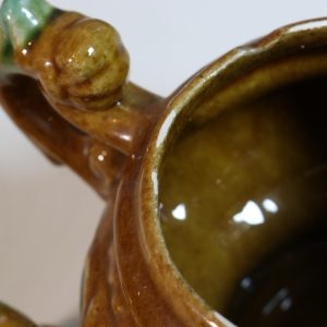SKÅL, troligen Majolika, brun med gröna detaljer