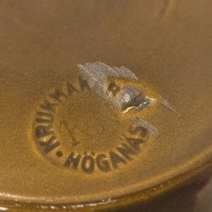 Grön höganäs krus