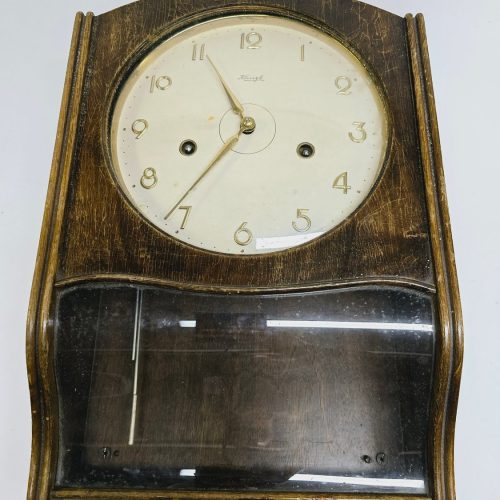 Elegant Väggklocka från Kienzle – Klassisk Design i Trä