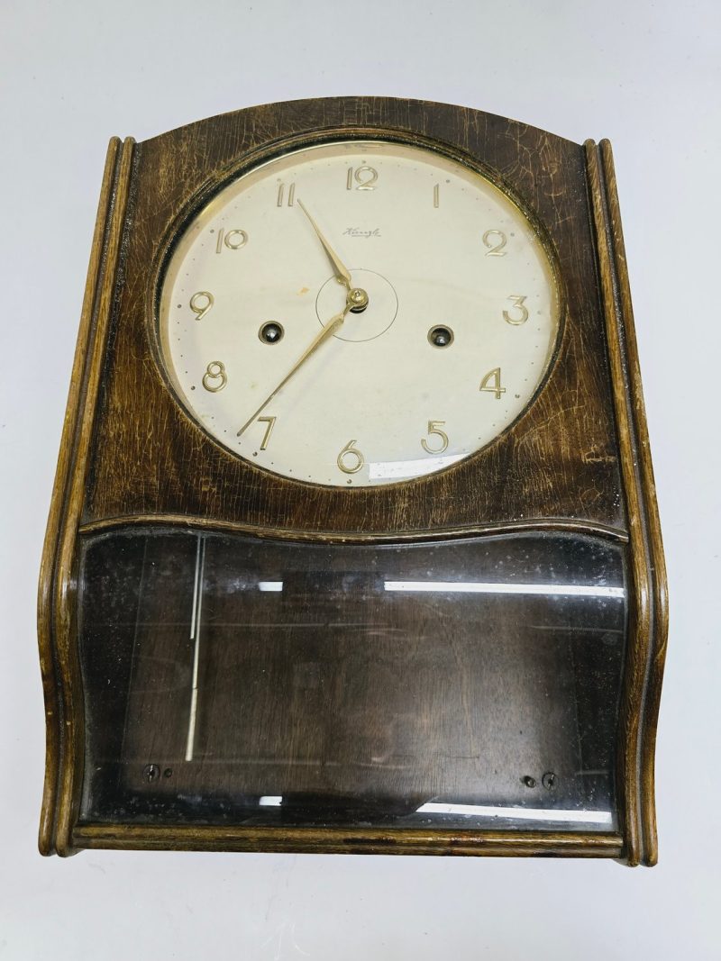 Elegant Väggklocka från Kienzle – Klassisk Design i Trä