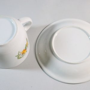 Kaffekopp med fat, fruktmotiv