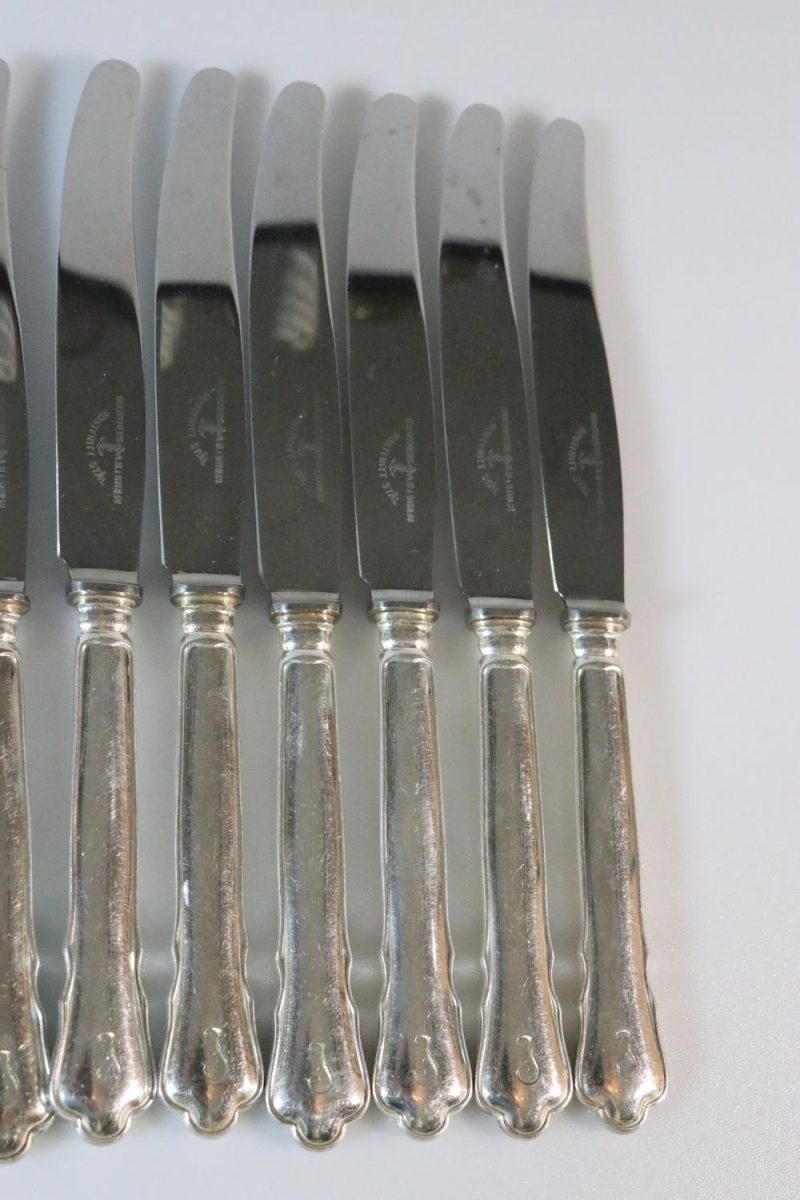 Knivar, märkta "Guldsmeds AB i Sthlm", rostfritt, 12 delar
