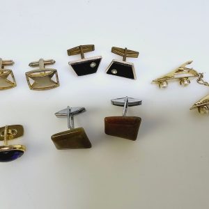 Elegant samling av vintage manschettknappar och accessoarer