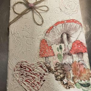 Charmigt handgjort decoupage-konstverk med rustik blomdetalj