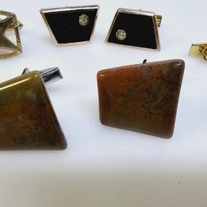 Elegant samling av vintage manschettknappar och accessoarer