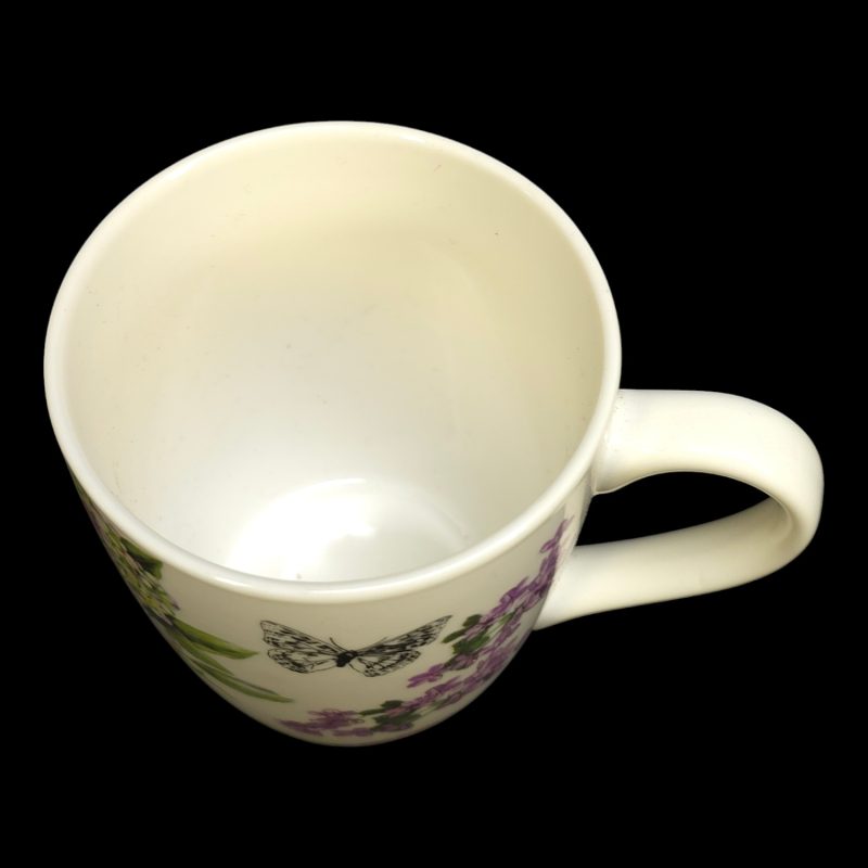 Charmig mugg med blommotiv och fjäril – Perfekt för naturälskare!