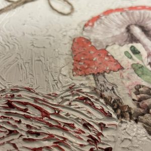 Charmigt handgjort decoupage-konstverk med rustik blomdetalj