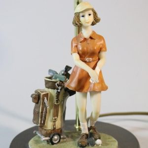 Bordslampa, med figur av kvinna med golfklubba - golf
