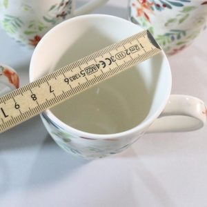 5st tekoppar med vacker blad/blomster mönster