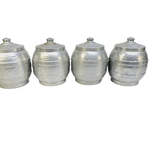 Charmigt set med fyra vintageburkar i hamrad aluminium – tidlös design
