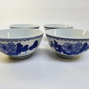 Elegant kinesisk porslinsburk med rottingflätad design – ett tidlöst hantverk!